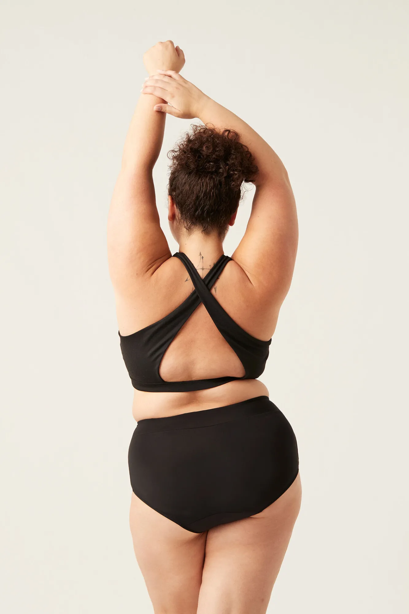 Modibodi Braga bikini menstrual alta nailon reciclado negra absorción ligera moderada