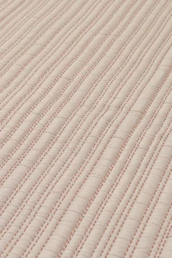 Textura Edredón liso reversible pespuntes