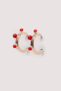 Springfield Pendientes bolitas rojas