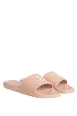 Calvin Klein Sandalias slides con logo grabado.